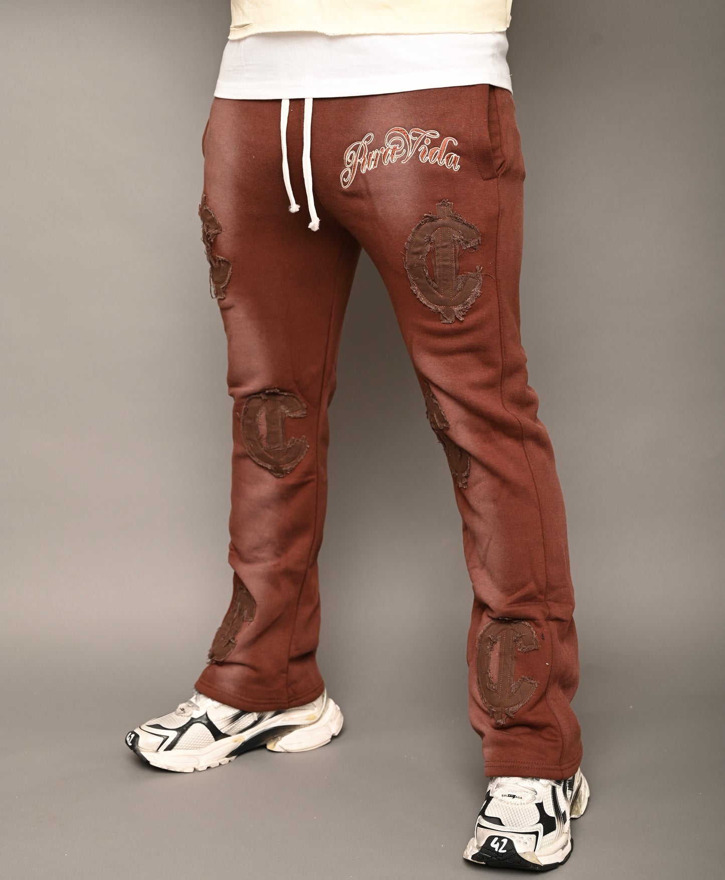 “Cent Logo Distressed Pants”