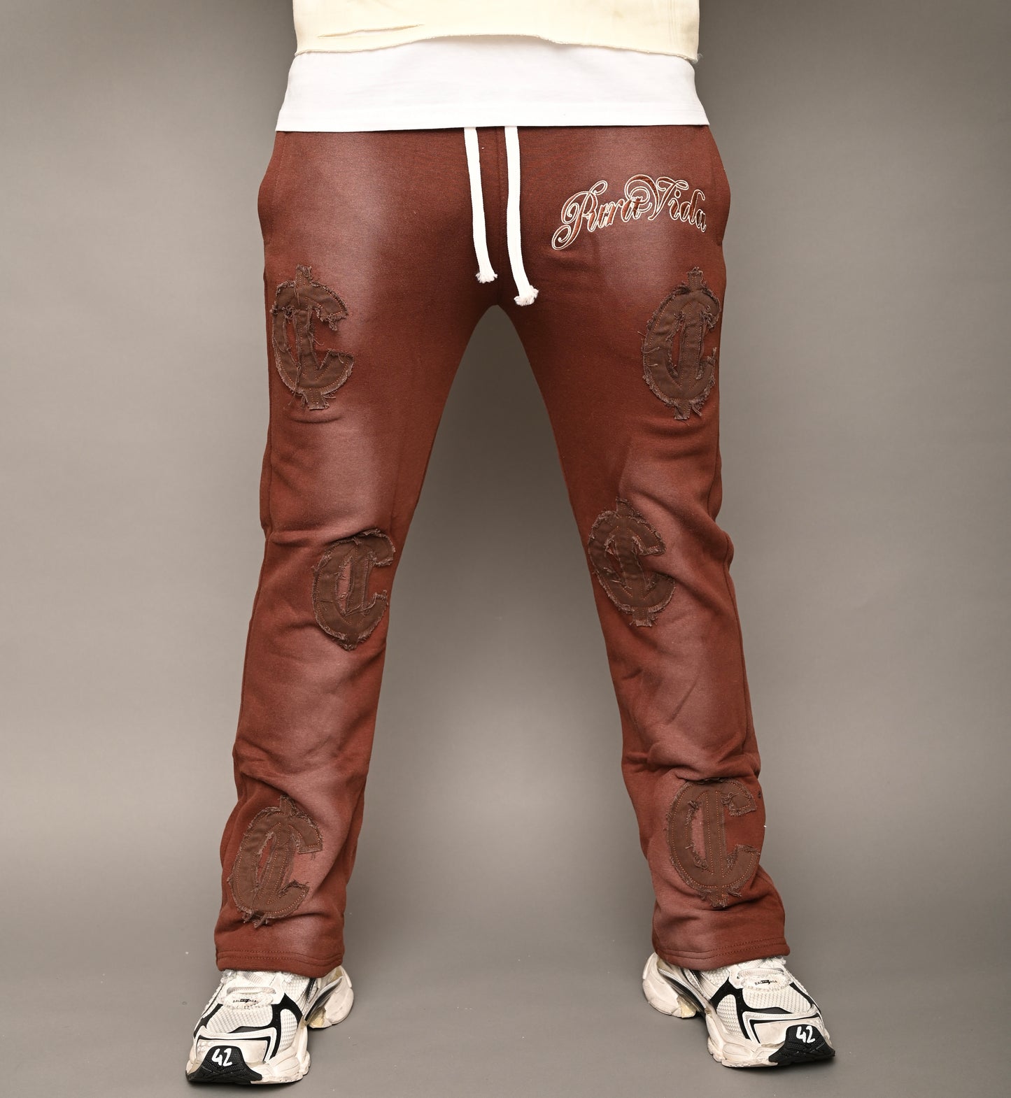 “Cent Logo Distressed Pants”